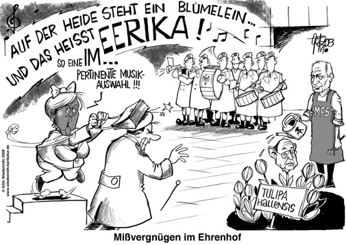 Stasiverdacht, Angela Merkel, IM Erika, Robert Havemann, Hans-Dietrich Genscher, Markus Wolf, IM Tulpe, Rücktritt 1992, FDJ Sekretärin für Propaganda und Agitation, Auf der Heide steht ein Blümelein, und das heißt Erika, So eine impertinente Musikauswahl, Handtasche, Hieb, Dirigent, Militärkapelle, Wachbataillon, Kanzleramt, Markus Wolf, Marianne Birthler, Gauck-Behörde, BdStU, MfS, Staatssicherheitsdienst, Ministerium für Staatssicherheit